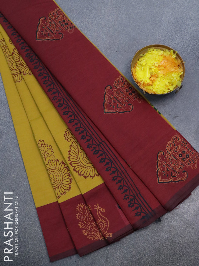 Poly cotton saree mustard shade and maroon with hand block prints and printed border