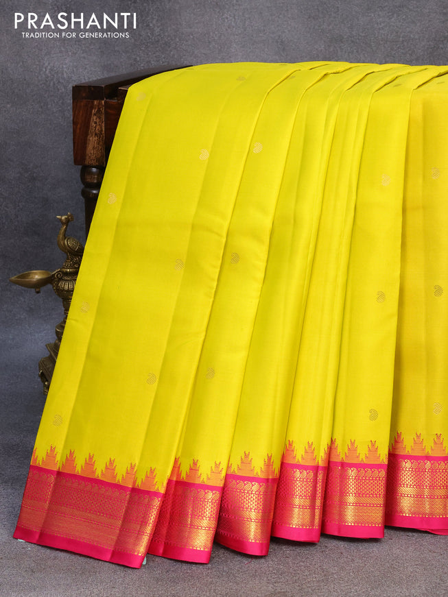 Pure kanjivaram silk saree lime yellow and pink with paisley zari woven buttas and zari woven korvai border