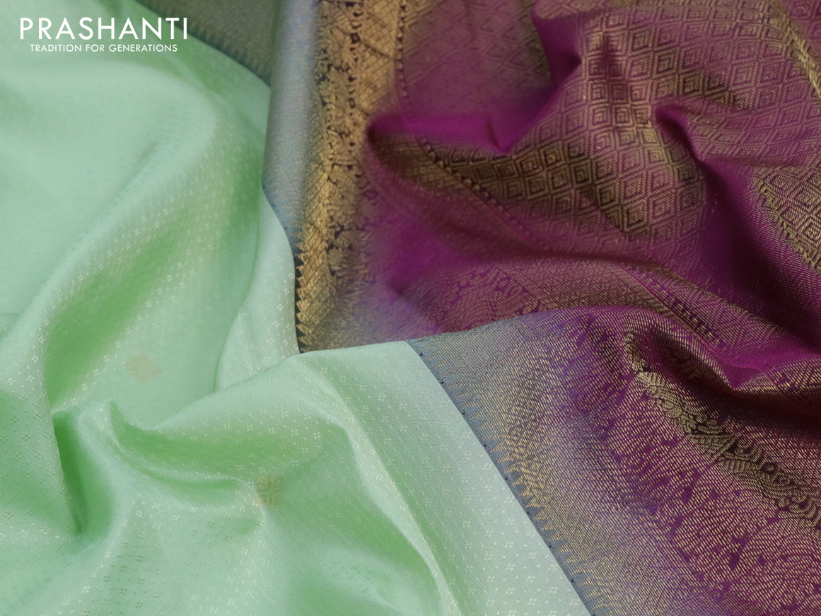 Pure kanjivaram silk saree pista green and purple with allover self emboss & zari buttas and annam zari woven korvai border