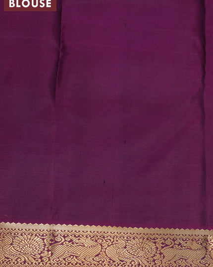 Pure kanjivaram silk saree pista green and purple with allover self emboss & zari buttas and annam zari woven korvai border