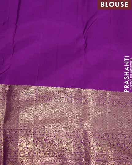 Pure kanjivaram silk saree light pink and purple with allover zari woven brocade weaves and zari woven border