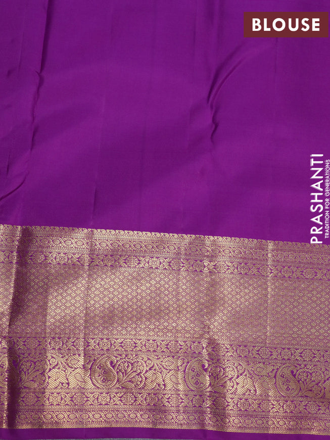 Pure kanjivaram silk saree light pink and purple with allover zari woven brocade weaves and zari woven border