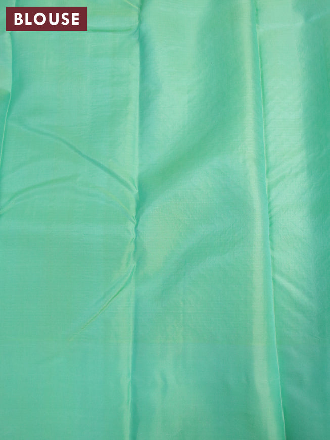 Pure soft silk saree black and pastel green with allover zari weaves and simple border