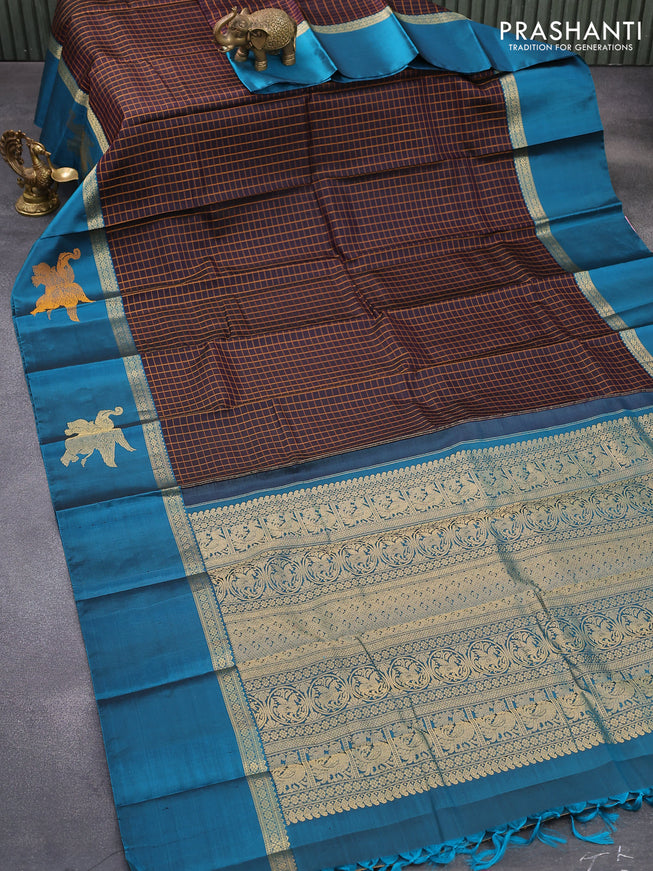 Pure kanjivaram silk saree deep jamun shade and peacock blue with allover thread woven checked pattern and zari woven butta border