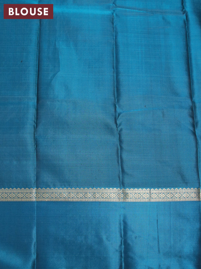 Pure kanjivaram silk saree deep jamun shade and peacock blue with allover thread woven checked pattern and zari woven butta border