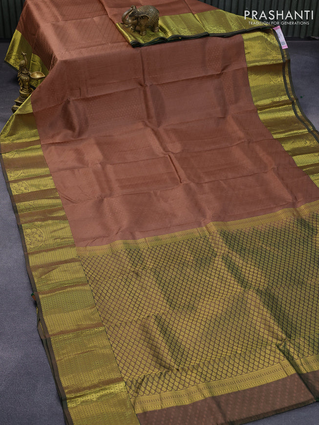 Pure kanjivaram silk saree pastel brown and green with allover self emboss and zari woven border