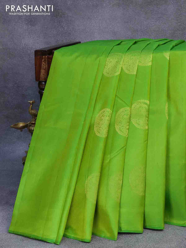 Pure kanjivaram silk saree light green and black with zari woven buttas in borderless style