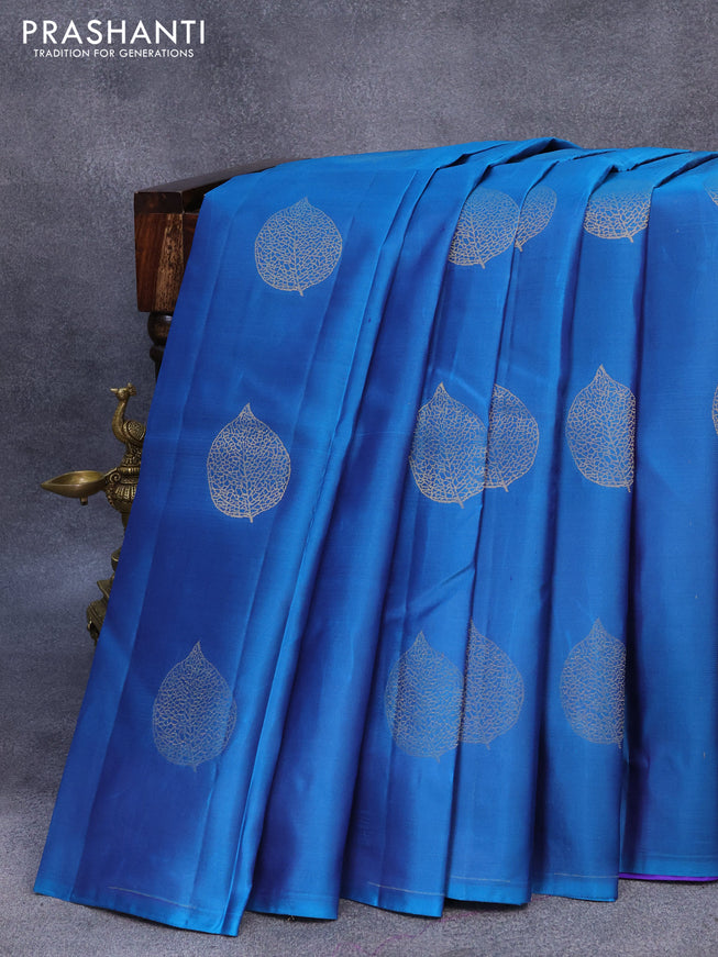 Pure kanjivaram silk saree dual shade of teal blue and blue with zari woven leaf buttas in borderless style