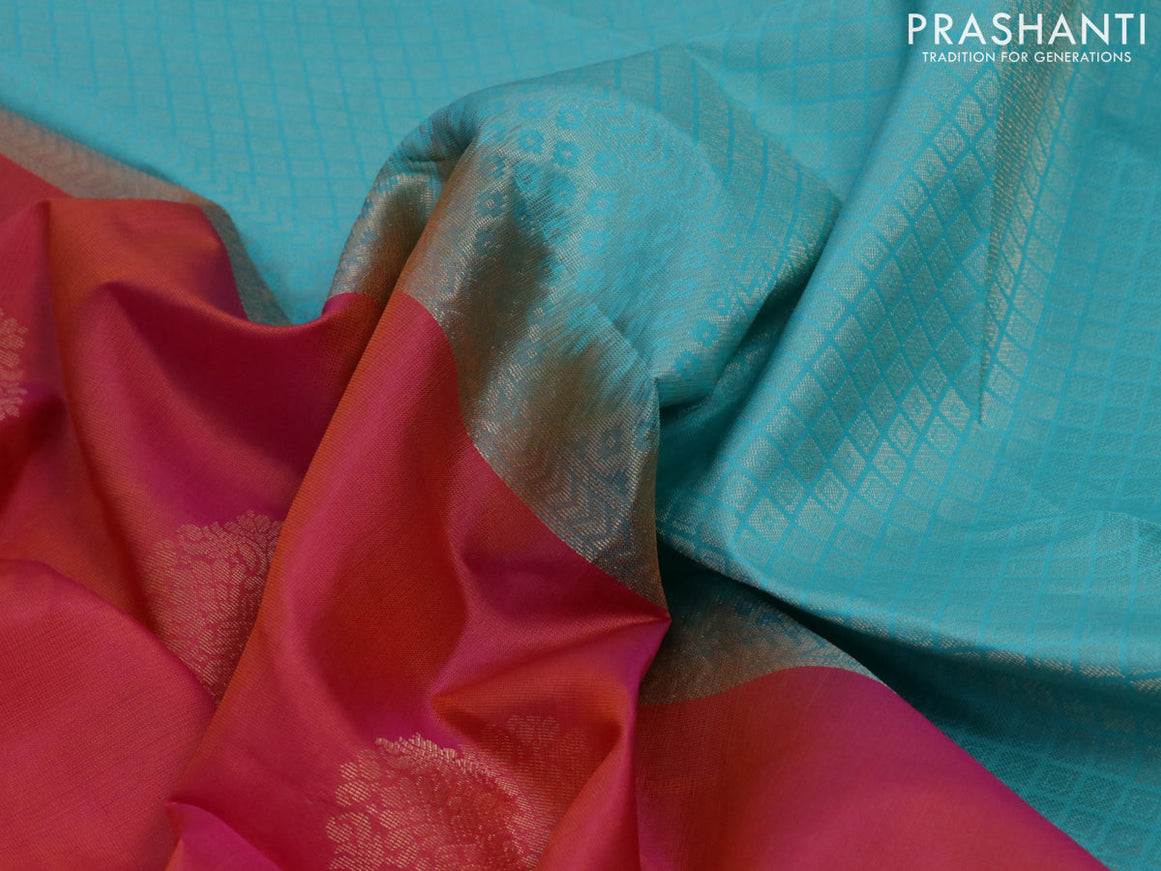 Pure kanjivaram silk saree dual shade of pinkish orange and light blue with zari woven buttas in borderless style
