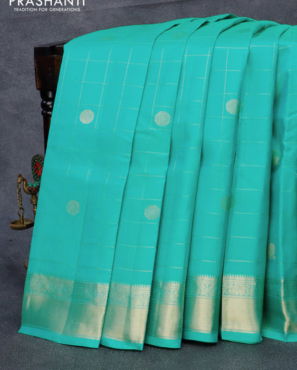 Pure kanjivaram silk saree dual shade of teal blue and pink with allover zari checked pattern & zari buttas and zari woven border