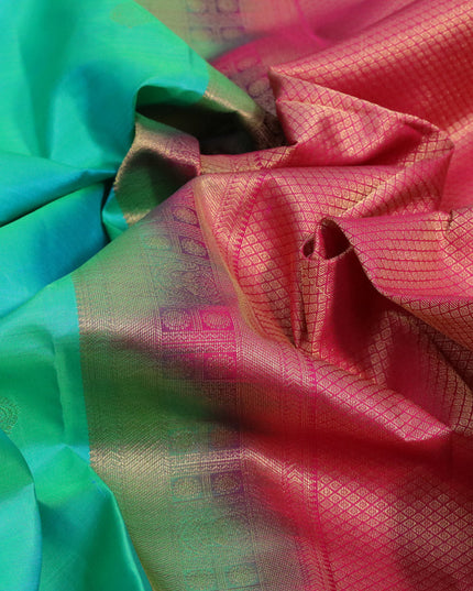 Pure kanjivaram silk saree dual shade of teal green and pink with zari woven buttas and zari woven border