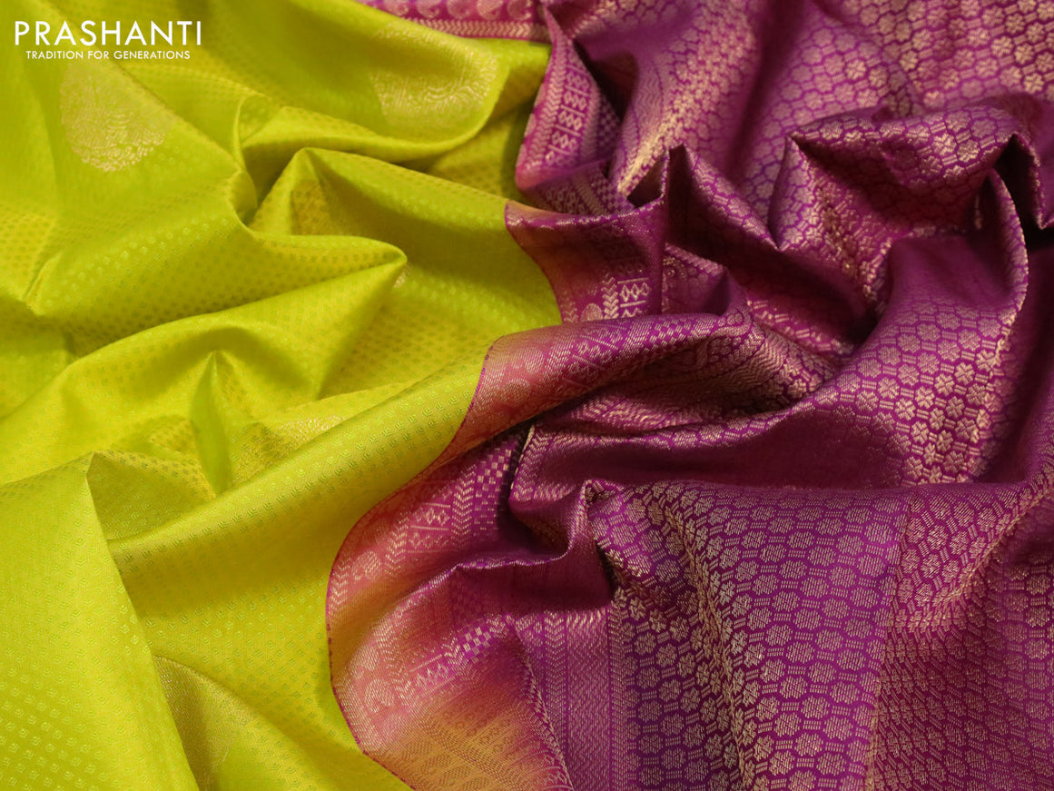 Pure kanjivaram silk saree lime yellow and purple with allover self emboss & zari buttas and zari woven border