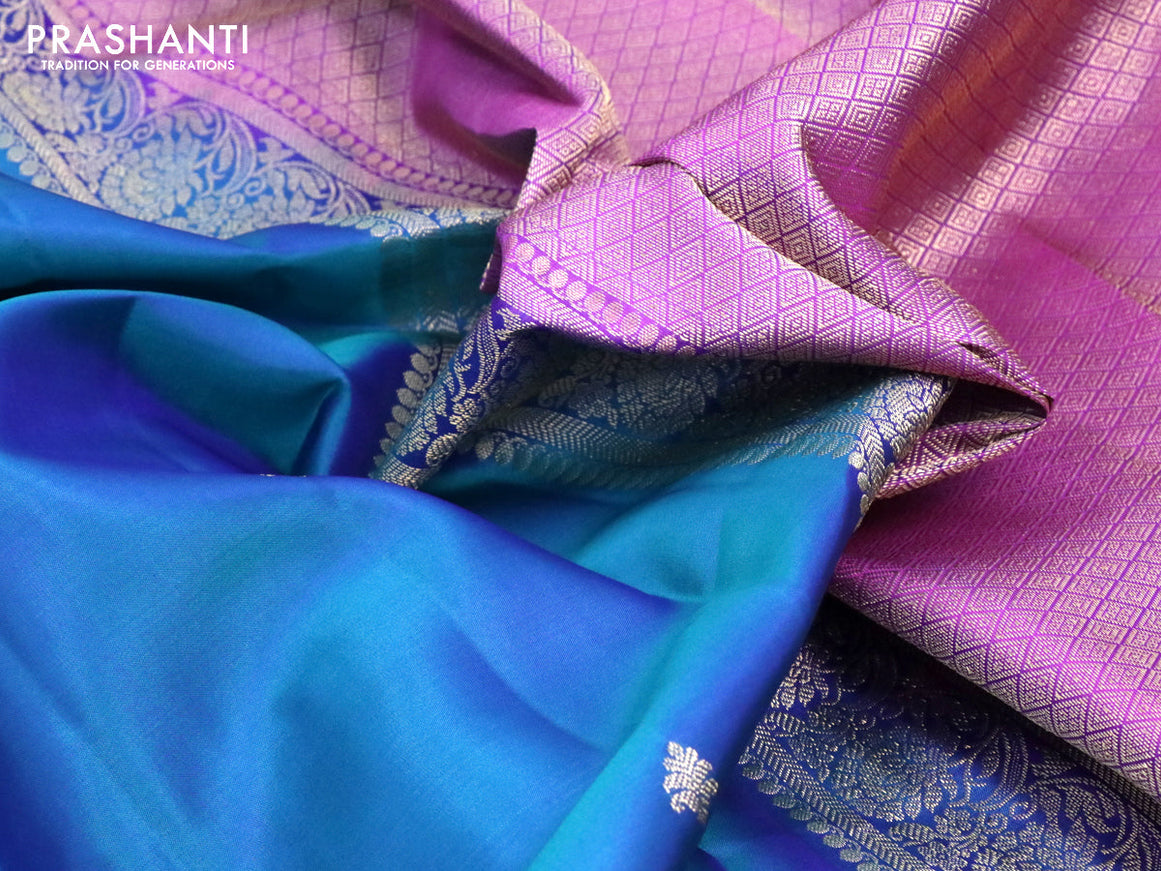 Pure kanjivaram silk saree dual shade of cs blue and purple with zari woven buttas and floral zari woven border