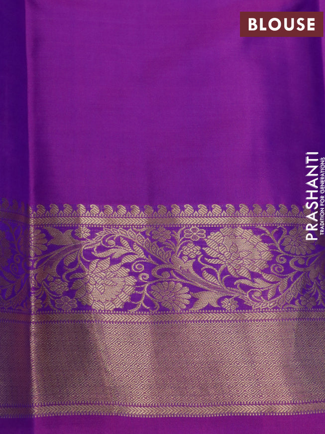 Pure kanjivaram silk saree dual shade of cs blue and purple with zari woven buttas and floral zari woven border