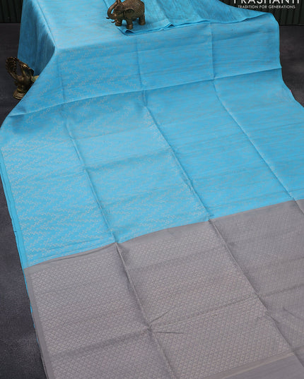 Pure raw silk saree light blue and grey with allover silver zari weaves in borderless style