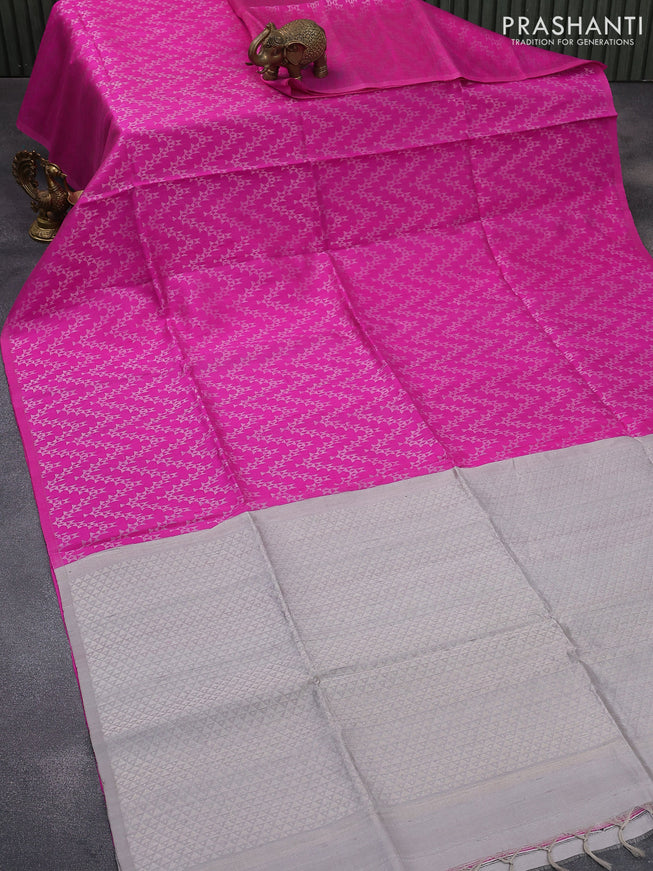 Pure raw silk saree pink and grey with allover silver zari weaves in borderless style