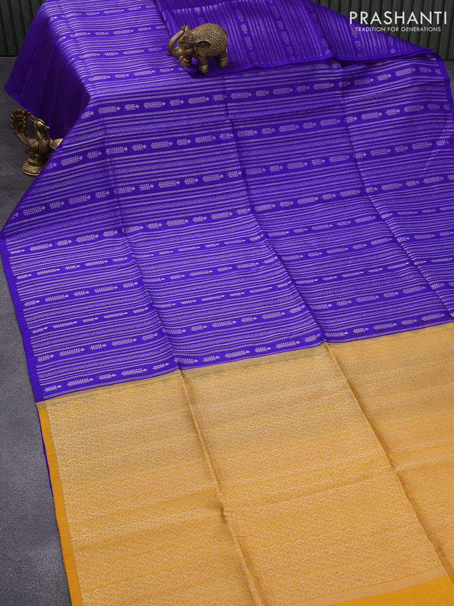 Pure raw silk saree royal blue and yellow with allover silver zari weaves in borderless style