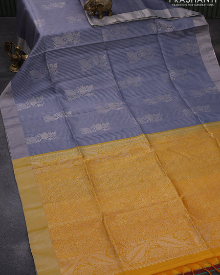 Pure raw silk saree grey and yellow with silver zari woven butta weaves and silver zari woven border