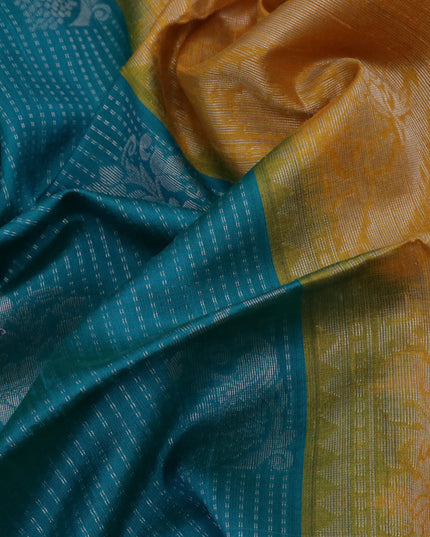 Pure raw silk saree dual shade of teal blue and yellow with silver zari woven butta weaves and silver zari woven border
