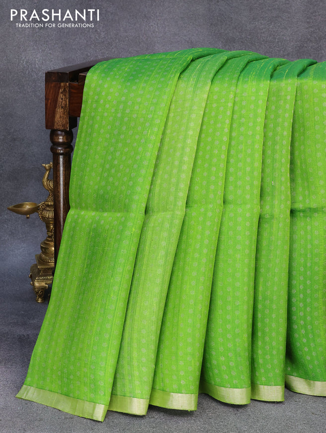 Pure raw silk saree light green and pink with silver zari woven butta weaves and silver zari woven border