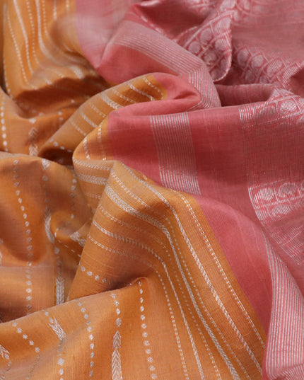 Pure raw silk saree sandal and pastel pink with allover silver zari weaves in borderless style