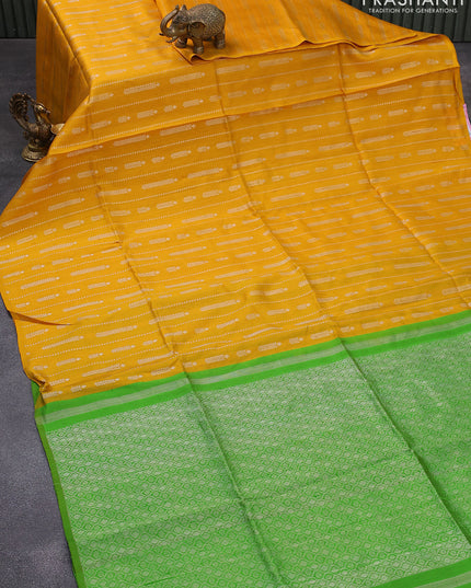 Pure raw silk saree yellow and green with allover silver zari weaves in borderless style