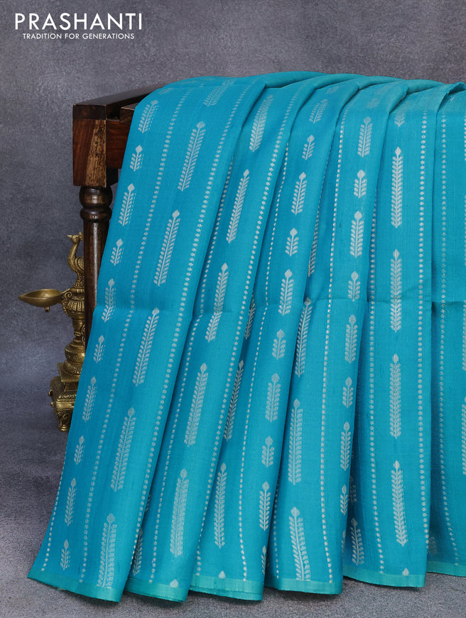 Pure raw silk saree teal blue and mustard yellow with allover silver zari weaves in borderless style