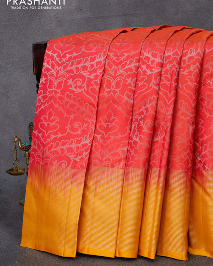Pure soft silk saree dual shade of pinkish orange and mustard yellow with allover silver zari woven brocade weaves and silver zari woven border