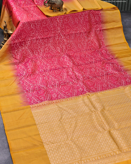 Pure soft silk saree dual shade of pinkish orange and mustard yellow with allover silver zari woven brocade weaves and silver zari woven border