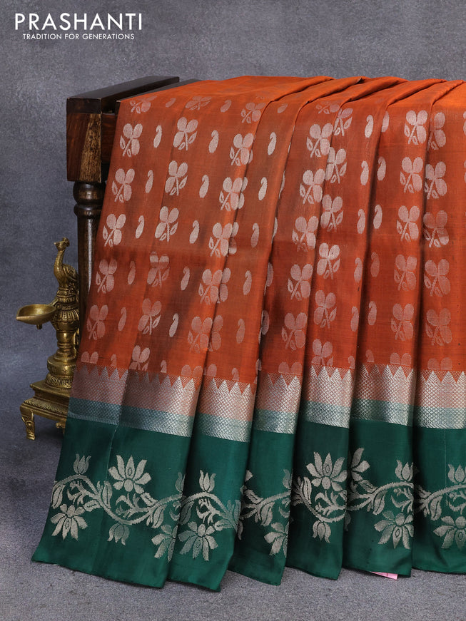 Pure uppada silk saree rustic orange and dark green with allover silver zari woven butta weaves and silver zari woven border