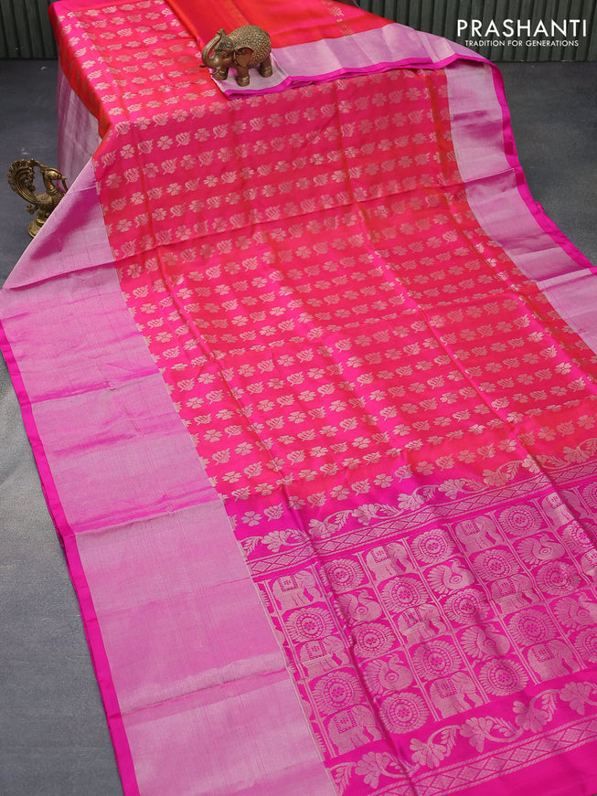 Pure uppada silk saree dual shade of pinkish orange and pink with allover silver zari woven butta weaves and long silver zari woven border