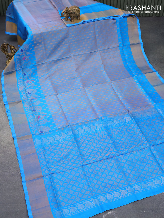 Pure uppada silk saree blue shade and blue with allover silver zari woven tilak butta weaves and long peacock design zari woven border