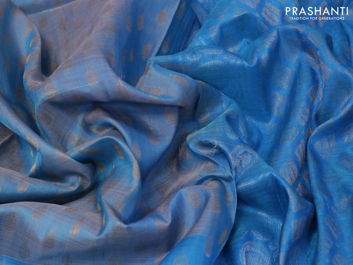 Pure uppada silk saree blue shade and blue with allover silver zari woven tilak butta weaves and long peacock design zari woven border