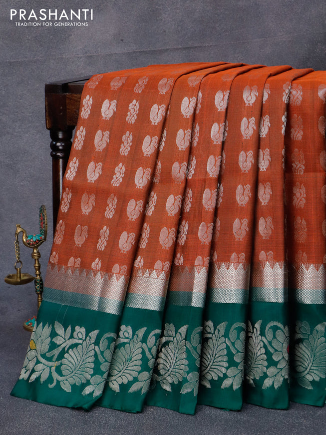 Pure uppada silk saree rustic orange and dark green with allover silver zari woven butta weaves and long silver zari woven border