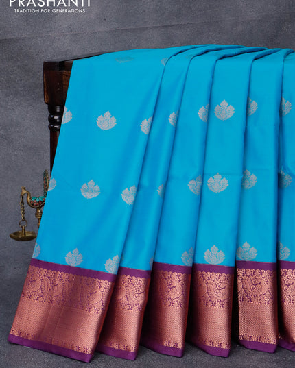 Semi soft silk saree cs blue and purple with copper zari woven buttas and zari woven border