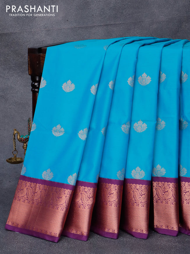 Semi soft silk saree cs blue and purple with copper zari woven buttas and zari woven border