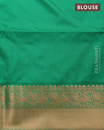 Semi soft silk saree peach orange and green with allover self emboss & copper zari weaves and zari woven border