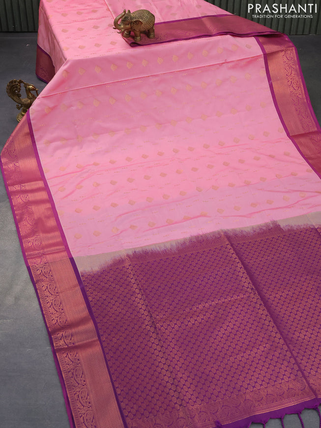 Semi soft silk saree light pink shade and violet with allover zari woven butta weaves and copper zari woven border