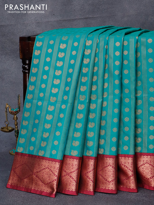 Semi soft silk saree peacock green and dark magenta with allover copper zari weaves and copper zari woven border