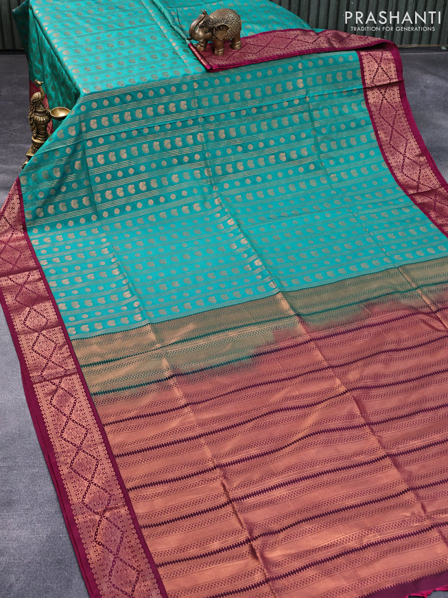 Semi soft silk saree peacock green and dark magenta with allover copper zari weaves and copper zari woven border