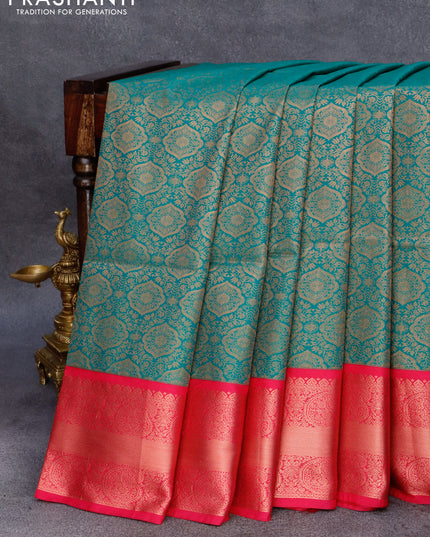 Semi soft silk saree green and pink with allover zari woven brocade weaves and copper zari woven border