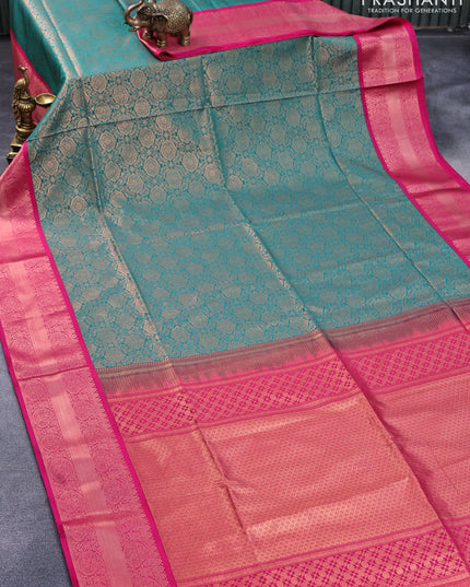 Semi soft silk saree green and pink with allover zari woven brocade weaves and copper zari woven border