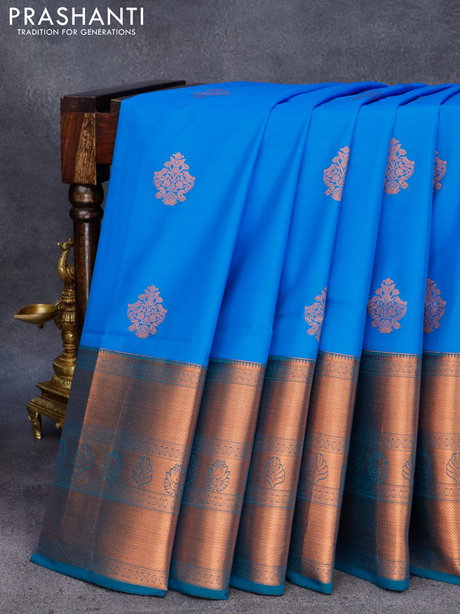 Semi soft silk saree cs blue and deep jamun shade with copper zari woven buttas and long copper zari woven border