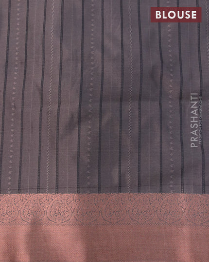 Semi soft silk saree light green and dark grey with allover self emboss & zari weaves and zari woven border