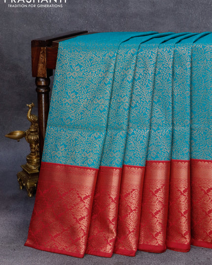 Semi soft silk saree cs blue and maroon with allover copper zari woven brocade weaves and copper zari woven border