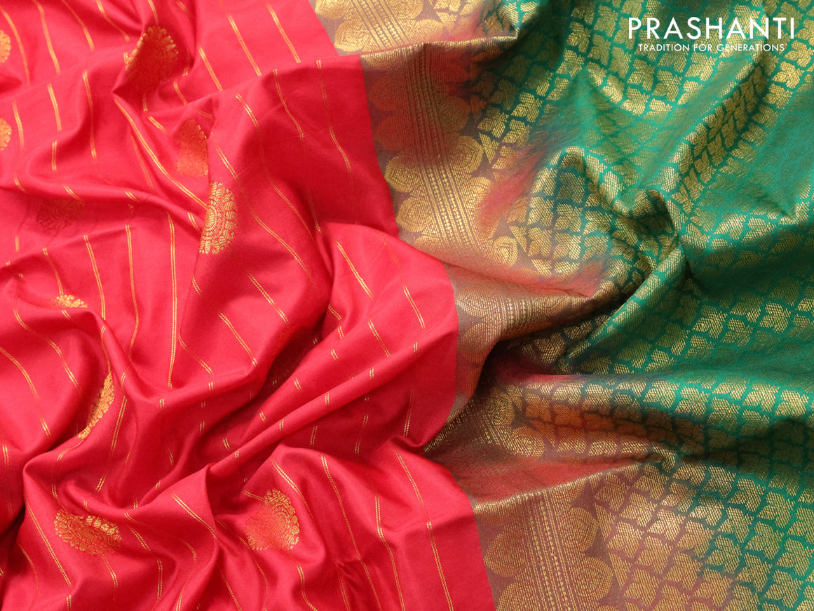 Semi soft silk saree red and green with allover copper zari weaves and zari woven border