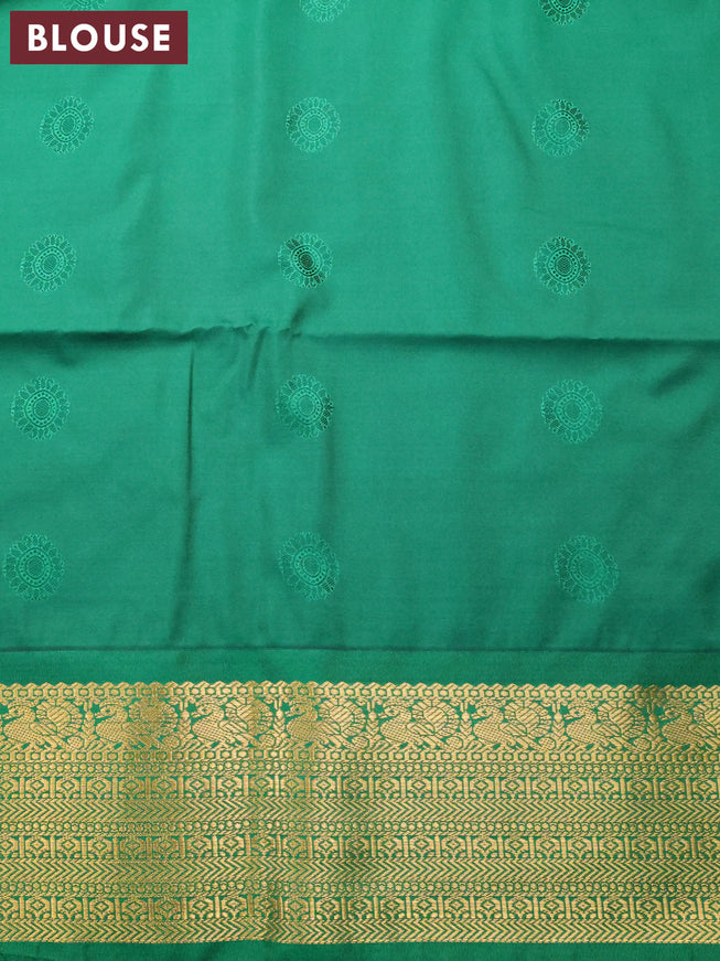 Semi soft silk saree red and green with allover copper zari weaves and zari woven border