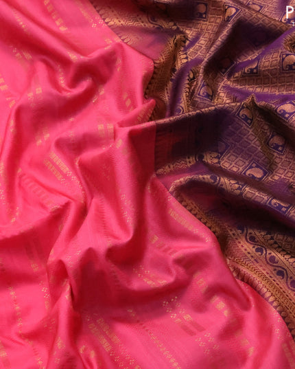Semi soft silk saree pink shade and deep violet with allover zari weaves and copper zari woven border