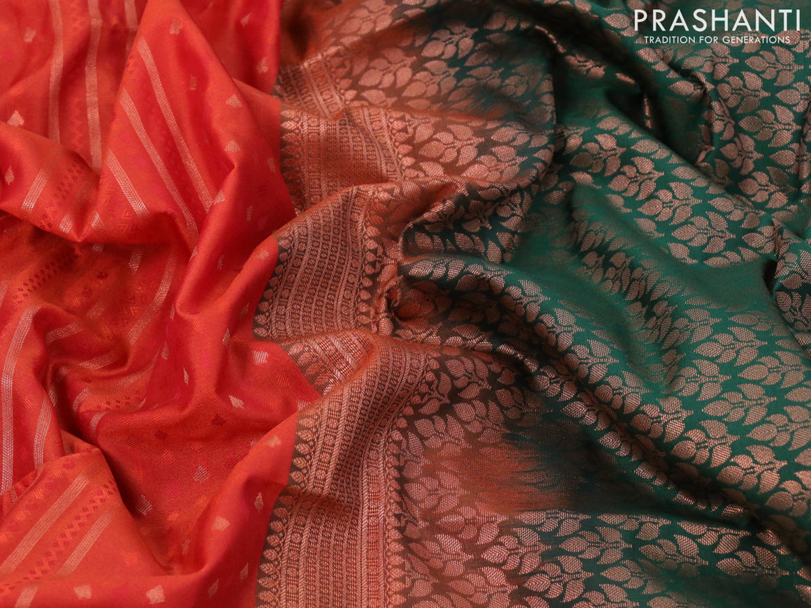 Semi soft silk saree reddish orange and dark green with allover self emboss & stripes and copper zari woven border