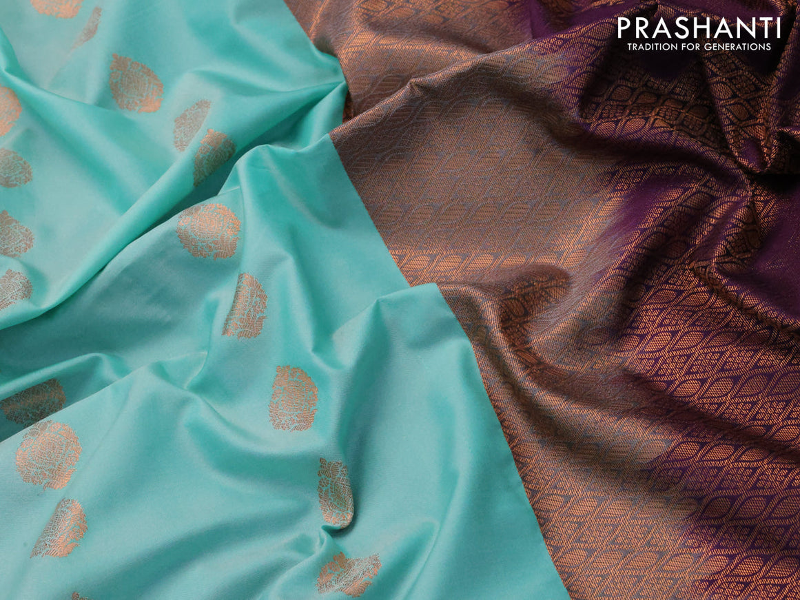 Semi soft silk saree teal blue and violet with copper zari woven buttas and zari woven border